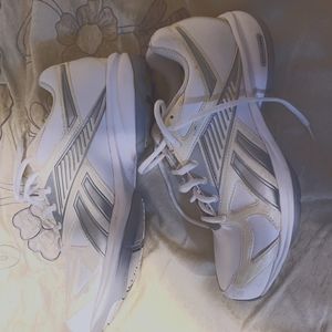 Reebok Tennis shoes worn one. Like new.